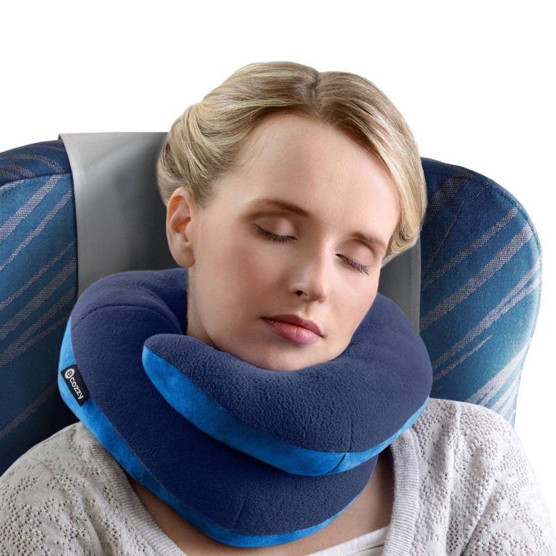 BCOZZY Chin Supporting Travel Pillow used by sleeping woman on airplane seat