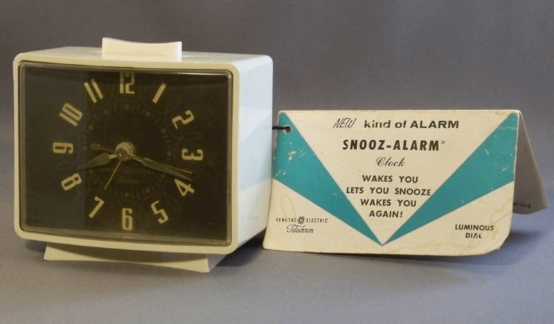 A vintage clock with a snooze alarm