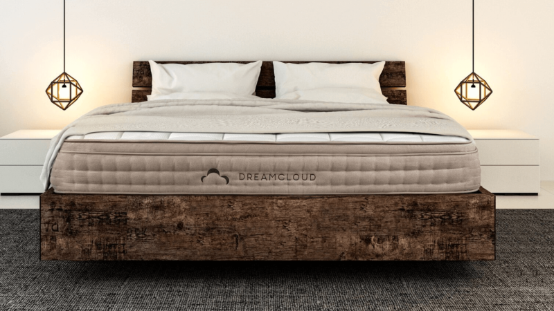 Dreamcloud mattress on weathered wooden frame